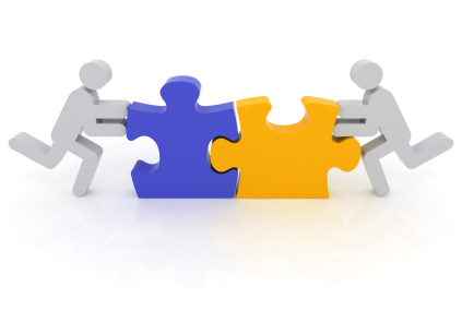 1:1 Presentation Coaching and mentoring two symbolic figures pushing two jigsaw pieces together